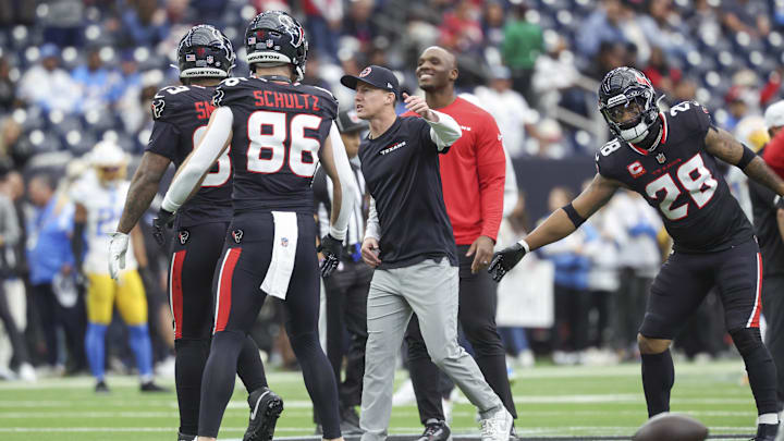Jan 11, 2025; Houston, Texas, USA; Houston Texans offensive coordinator Bobby Slowik on the field before the game against the Los Angeles Chargers in an AFC wild card game at NRG Stadium. Mandatory Credit: Troy Taormina-Imagn Images