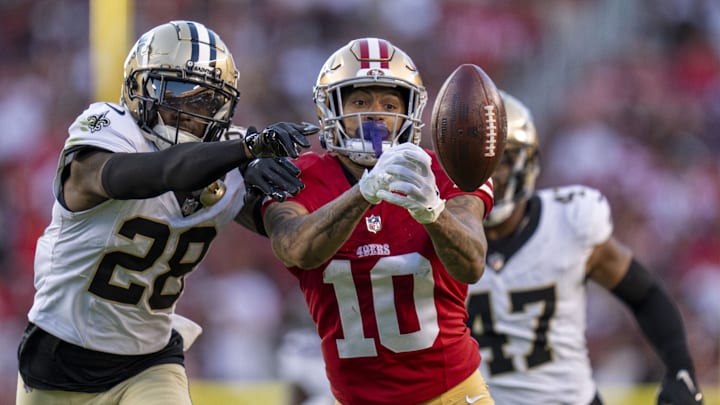 August 18, 2024; Santa Clara, California, USA; San Francisco 49ers wide receiver Ronnie Bell (10) misses a catch defended by New Orleans Saints cornerback Rejzohn Wright (28) during the third quarter at Levi's Stadium. Mandatory Credit: Kyle Terada-Imagn Images