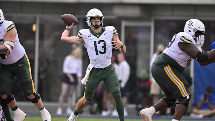 Sep 6, 2025; Dallas, Texas, USA; Baylor Bears quarterback Sawyer Robertson (13) passes the ball during the second quarter against the SMU Mustangs at Gerald J. Ford Stadium. Mandatory Credit: Jerome Miron-Imagn Images
