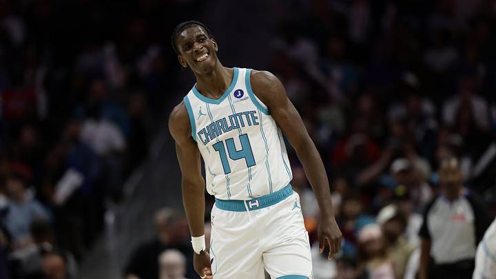 Mar 28, 2026; Charlotte, North Carolina, USA; Charlotte Hornets forward Moussa Diabaté (14) walks back down the court during the third quarter against the Philadelphia 76ers at Spectrum Center. Mandatory Credit: Brian Westerholt-Imagn Images
