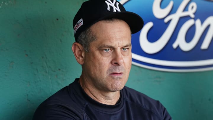 Jun 13, 2025; Boston, Massachusetts, USA; New York Yankees manager Aaron Boone (17) in the dugout before the start of the game against the Boston Red Sox at Fenway Park. Mandatory Credit: David Butler II-Imagn Images