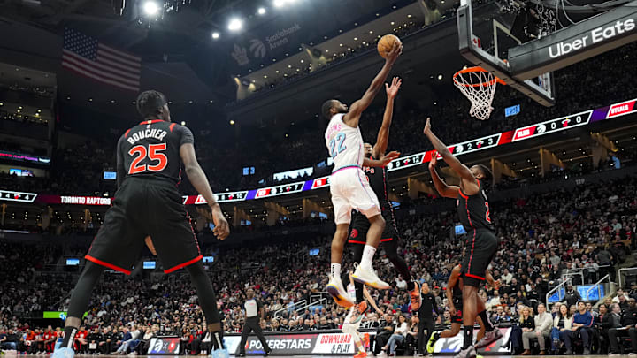 Feb 21, 2025; Toronto, Ontario, CAN; Miami Heat forward Andrew Wiggins (22) drives to the net against the Toronto Raptors during the first half at Scotiabank Arena. Mandatory Credit: Kevin Sousa-Imagn Images Feb 21, 2025; Toronto, Ontario, CAN; Miami Heat forward Andrew Wiggins (22) drives to the net against the Toronto Raptors during the first half at Scotiabank Arena. Mandatory Credit: Kevin Sousa-Imagn Images