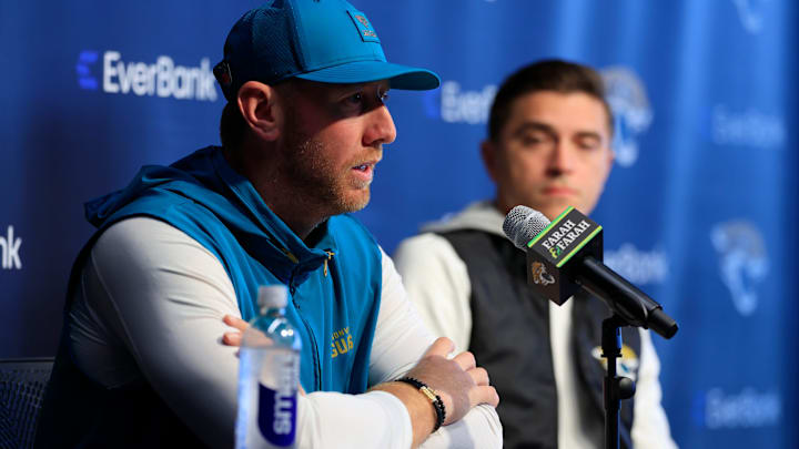 Jacksonville Jaguars head coach Liam Coen speaks during a press conference as general manager James Gladstone looks on at the Miller Electric Center, Wednesday, Jan. 14, 2026, in Jacksonville, Fla.