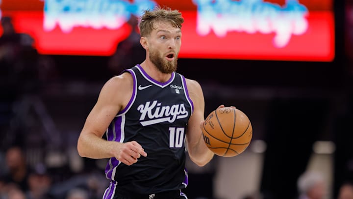 Oct 27, 2023; Sacramento, California, USA; Sacramento Kings forward Domantas Sabonis (10) dribbles the ball up the court against the Golden State Warriors during the first quarter at Golden 1 Center. Mandatory Credit: Sergio Estrada-Imagn Images