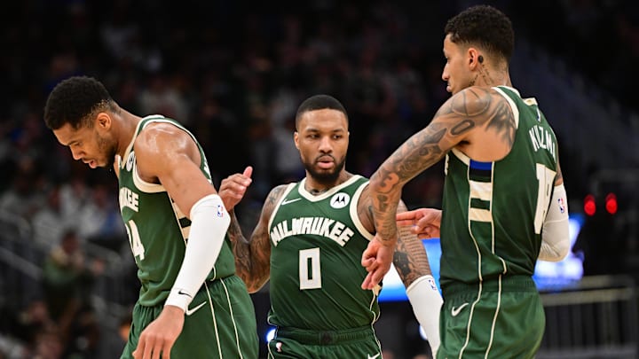 Feb 27, 2025; Milwaukee, Wisconsin, USA; Milwaukee Bucks guard Damian Lillard (0) celebrates a three-point basket with forward Giannis Antetokounmpo (34) and forward Kyle Kuzma (18) in the fourth quarter against the Denver Nuggets at Fiserv Forum. Mandatory Credit: Benny Sieu-Imagn Images Feb 27, 2025; Milwaukee, Wisconsin, USA; Milwaukee Bucks guard Damian Lillard (0) celebrates a three-point basket with forward Giannis Antetokounmpo (34) and forward Kyle Kuzma (18) in the fourth quarter against the Denver Nuggets at Fiserv Forum. Mandatory Credit: Benny Sieu-Imagn Images
