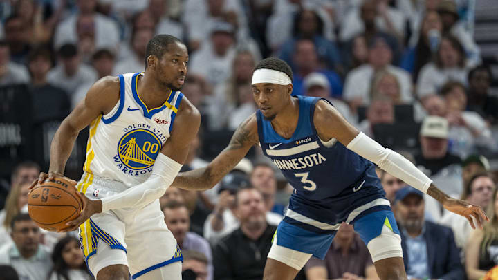 May 14, 2025; Minneapolis, Minnesota, USA; Golden State Warriors forward Jonathan Kuminga (00) looks to pass the ball as Minnesota Timberwolves forward Jaden McDaniels (3) plays defense in the first half during game five of the second round for the 2025 NBA Playoffs at Target Center. Mandatory Credit: Jesse Johnson-Imagn Images May 14, 2025; Minneapolis, Minnesota, USA; Golden State Warriors forward Jonathan Kuminga (00) looks to pass the ball as Minnesota Timberwolves forward Jaden McDaniels (3) plays defense in the first half during game five of the second round for the 2025 NBA Playoffs at Target Center. Mandatory Credit: Jesse Johnson-Imagn Images