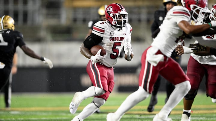 Nov 9, 2024; Nashville, Tennessee, USA; South Carolina Gamecocks running back Raheim Sanders (5) runs the ball against the Vanderbilt Commodores during the second half at FirstBank Stadium. Nov 9, 2024; Nashville, Tennessee, USA; South Carolina Gamecocks running back Raheim Sanders (5) runs the ball against the Vanderbilt Commodores during the second half at FirstBank Stadium.