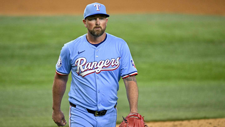 Sep 22, 2024; Arlington, Texas, USA; Texas Rangers relief pitcher Kirby Yates (39) walks off the field after he pitches against the Seattle Mariners during the ninth inning at Globe Life Field. 