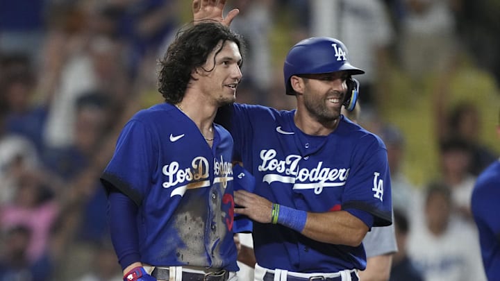 Jul 25, 2023; Los Angeles, California, USA; Los Angeles Dodgers center fielder James Outman (33) celebrates with shortstop Chris Taylor (3) after hitting a walk-off double in the 10th inning against the Toronto Blue Jays at Dodger Stadium. Mandatory Credit: Kirby Lee-Imagn Images Jul 25, 2023; Los Angeles, California, USA; Los Angeles Dodgers center fielder James Outman (33) celebrates with shortstop Chris Taylor (3) after hitting a walk-off double in the 10th inning against the Toronto Blue Jays at Dodger Stadium. Mandatory Credit: Kirby Lee-Imagn Images