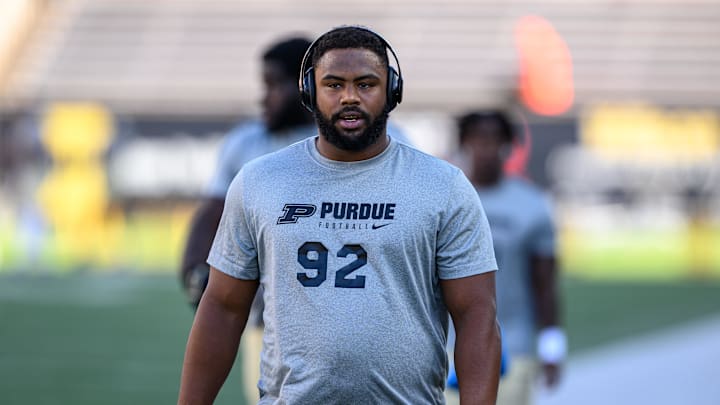 Sep 21, 2024; Corvallis, Oregon, USA; Purdue Boilermakers defensive lineman Mo Omonode (92) walks the field before the game against the Oregon State Beavers at Reser Stadium. Mandatory Credit: Craig Strobeck-Imagn Images