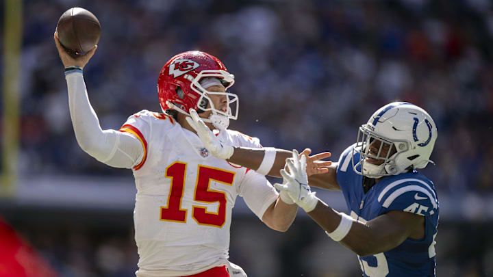 Sep 25, 2022; Indianapolis, Indiana, USA; Kansas City Chiefs quarterback Patrick Mahomes (15) tries to throw a pass over Indianapolis Colts linebacker E.J. Speed (45) during the second half at Lucas Oil Stadium. Mandatory Credit: Marc Lebryk-Imagn Images