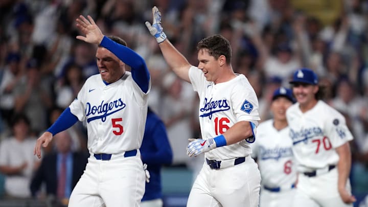 Los Angeles, California, USA; Los Angeles Dodgers catcher Will Smith (16) celebrates with first baseman Freddie Freeman (5) after hitting a walk-off home run against the San Diego Padres at Dodger Stadium.