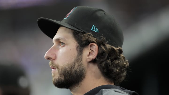May 29, 2024; Arlington, Texas, USA; Arizona Diamondbacks pitcher Zac Gallen looks on during the seventh inning against the Texas Rangers at Globe Life Field. Mandatory Credit: Jim Cowsert-USA TODAY Sports