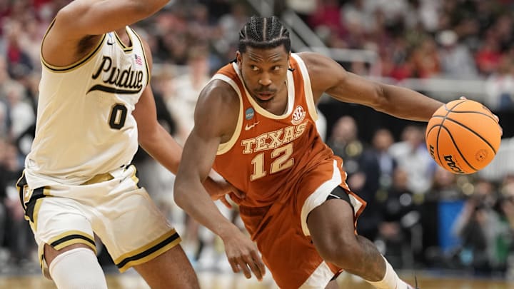 Mar 26, 2026; San Jose, CA, USA; Texas Longhorns guard Tramon Mark (12) goes to the basket against Purdue Boilermakers guard C.J. Cox (0) in the second half during a Sweet Sixteen game of the West Regional of the men's 2026 NCAA Tournament at SAP Center. Mandatory Credit: Kyle Terada-Imagn Images