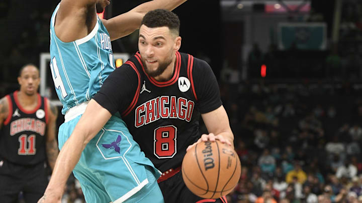 Jan 8, 2024; Charlotte, North Carolina, USA; Chicago Bulls guard Zach LaVine (8) drives past Charlotte Hornets guard Ish Smith (14) during the second half at the Spectrum Center. Mandatory Credit: Sam Sharpe-Imagn Images Jan 8, 2024; Charlotte, North Carolina, USA; Chicago Bulls guard Zach LaVine (8) drives past Charlotte Hornets guard Ish Smith (14) during the second half at the Spectrum Center. Mandatory Credit: Sam Sharpe-Imagn Images