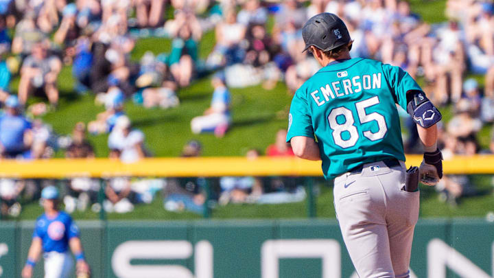 Mar 8, 2025; Mesa, Arizona, USA; Seattle Mariners infielder Colt Emerson (85) hits a home run in the top of the ninth during a spring training game against the Chicago Cubs at Sloan Park. Mandatory Credit: Allan Henry-Imagn Images