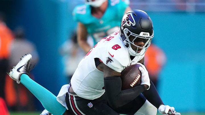 Aug 28, 2026; Miami Gardens, Florida, USA;  Miami Dolphins defensive back A.J. Green III (24) tackles Atlanta Falcons tight end Kyle Pitts Sr. (8) during the first quarter of a pre season game at Hard Rock Stadium.  Mandatory Credit: Rich Storry-Imagn Images