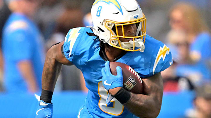 Oct 5, 2025; Inglewood, California, USA; Los Angeles Chargers running back Omarion Hampton (8) carries the ball against the Washington Commanders at SoFi Stadium. 