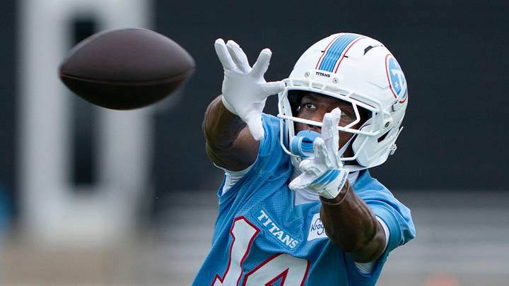 Tennessee Titans receiver Carnell Tate (14) makes a catch during OTAs at Vanderbilt Health Football Center in Nashville, Tenn., Monday, June 8, 2026. Tennessee Titans receiver Carnell Tate (14) makes a catch during OTAs at Vanderbilt Health Football Center in Nashville, Tenn., Monday, June 8, 2026.