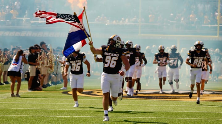 Sept 13, 2025; Columbia, Missouri, USA; Missouri Tigers defensive end Aidan Dubbert leads the team on the field ahead of their game against Louisiana at Faurot Field