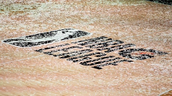 Mar 11, 2021; Orlando, Florida, USA; The NBA G League logo is covered in confetti after the Final between the Delaware Blue Coats and the Lakeland Magic at AdventHealth Arena. Mandatory Credit: Mary Holt-Imagn Images