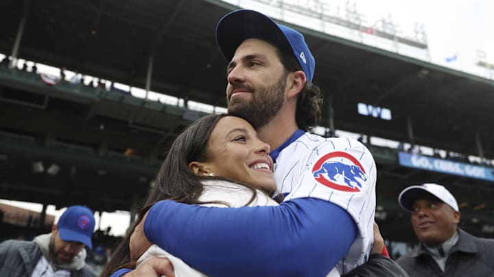 Chicago Cubs shortstop Dansby Swanson hugs his wife, Chicago Stars forward Mallory Swanson, on opening day at Wrigley Field on March 30, 2023, in Chicago. Chicago Cubs shortstop Dansby Swanson hugs his wife, Chicago Stars forward Mallory Swanson, on opening day at Wrigley Field on March 30, 2023, in Chicago.