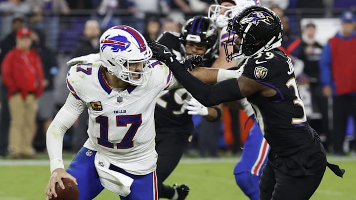 Sep 29, 2024; Baltimore, Maryland, USA; Buffalo Bills quarterback Josh Allen (17) scrambles from Baltimore Ravens safety Eddie Jackson (39)