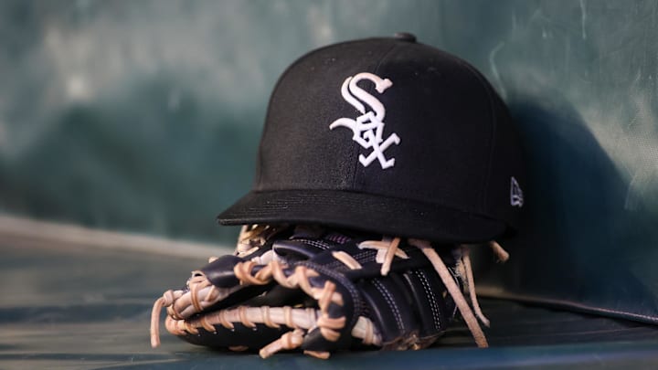 Jul 14, 2023; Atlanta, Georgia, USA; A detailed view of a Chicago White Sox hat and glove in the dugout against the Atlanta Braves in the fourth inning at Truist Park. Mandatory Credit: Brett Davis-Imagn Images Jul 14, 2023; Atlanta, Georgia, USA; A detailed view of a Chicago White Sox hat and glove in the dugout against the Atlanta Braves in the fourth inning at Truist Park. Mandatory Credit: Brett Davis-Imagn Images