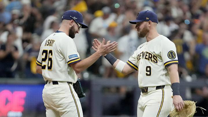 Milwaukee Brewers pitcher Aaron Ashby (26) and Milwaukee Brewers first baseman Jake Bauers (9) celebrate a 7-4 win of their National League Championship Series game against the Los Angeles Dodgers at American Family Field on Oct 12, 2026. Milwaukee Brewers pitcher Aaron Ashby (26) and Milwaukee Brewers first baseman Jake Bauers (9) celebrate a 7-4 win of their National League Championship Series game against the Los Angeles Dodgers at American Family Field on Oct 12, 2026.