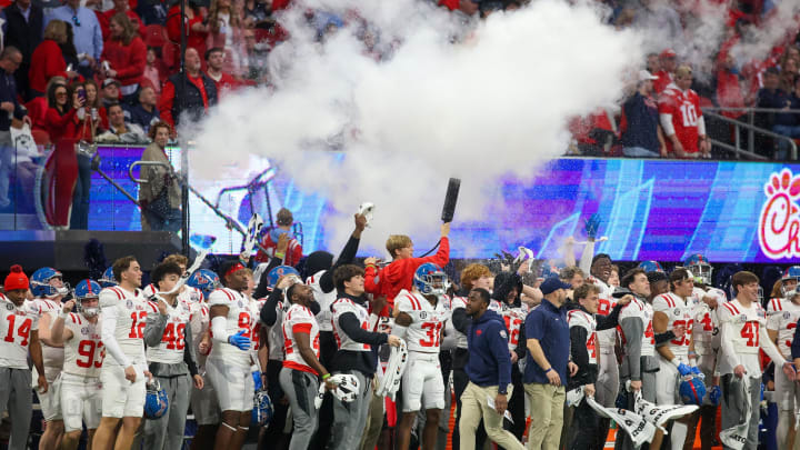 Dec 30, 2023; Atlanta, GA, USA; Mississippi Rebels head coach Lane Kiffin s (not pictured) son, Knox Kiffin, sprays a fire extinguisher before a kickoff against the Penn State Nittany Lions in the second quarter at Mercedes-Benz Stadium. Mandatory Credit: Brett Davis-USA TODAY Sports