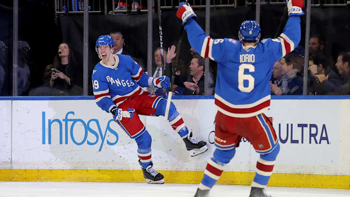 Mar 5, 2026; New York, New York, USA; New York Rangers right wing Jaroslav Chmelar (49) celebrates with defenseman Vincent Iorio (6) after scoring his first NHL goal during the third period against the Toronto Maple Leafs at Madison Square Garden. Mandatory Credit: Brad Penner-Imagn Images