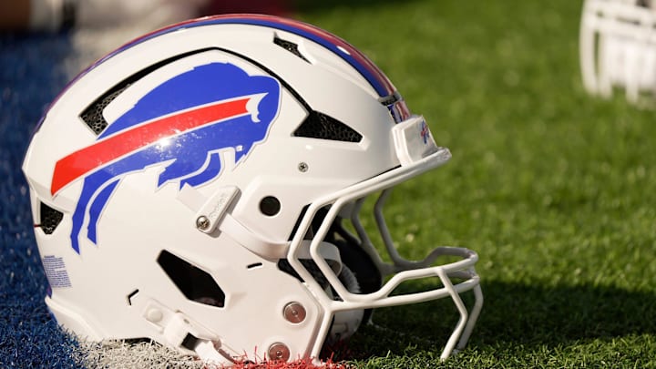 A Buffalo Bills helmet sits on a yard marker during stretching before the Return of the Blue & Red practice at Highmark Stadium in Orchard Park on Aug.1, 2025.