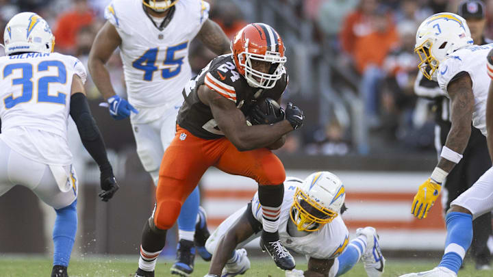 Nov 3, 2024; Cleveland, Ohio, USA; Cleveland Browns running back Nick Chubb (24) runs the ball against the Los Angeles Chargers during the third quarter at Huntington Bank Field. Mandatory Credit: Scott Galvin-Imagn Images