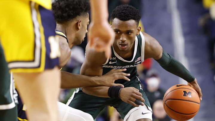 Feb 18, 2023; Ann Arbor, Michigan, USA;  Michigan State Spartans guard Tyson Walker (2) dribbles the
