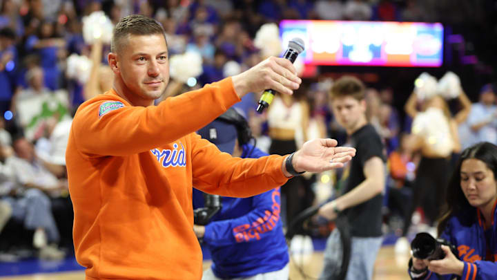 New Gator head football coach Jon Sumrall fires up the crowd during the first half an NCAA basketball game at Steven C. O'Connell Center Exactek arena in Gainesville, FL on Saturday, January 24, 2026. Auburn won 76-67 [Alan Youngblood/Gainesville Sun]