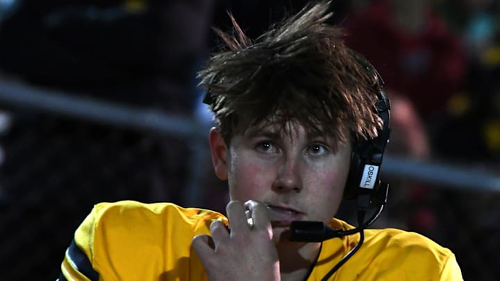 Moeller quarterback Matt Ponatoski, recently named Ohio Mr. Football and Gatorade Football Player of the Year, can often be seen wearing a headset as he is in the regional semifinal game with Princeton Nov. 15, 2024.