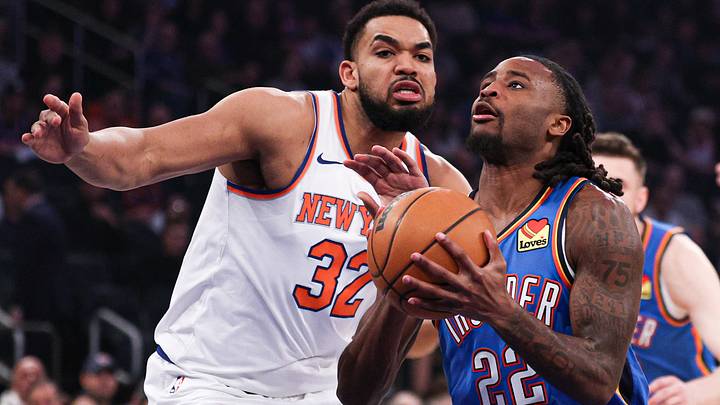 Mar 4, 2026; New York, New York, USA; Oklahoma City Thunder guard Cason Wallace (22) goes to the basket against New York Knicks center Karl-Anthony Towns (32) during the first half at Madison Square Garden. Mandatory Credit: Vincent Carchietta-Imagn Images