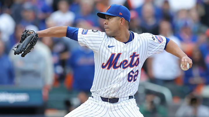 Oct 9, 2024; New York, New York, USA; New York Mets pitcher Jose Quintana (62) throws a pitch against the Philadelphia Phillies in the first inning in game four of the NLDS for the 2024 MLB Playoffs at Citi Field. 