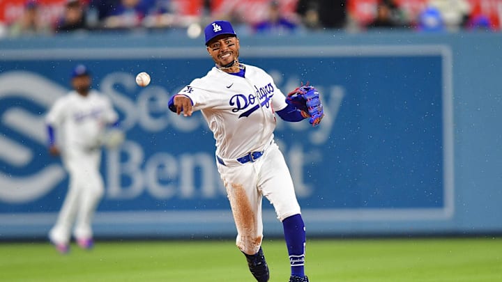 Mar 31, 2026; Los Angeles, California, USA; Los Angeles Dodgers shortstop Mookie Betts (50) throws to first for the out against Cleveland Guardians shortstop Gabriel Arias (13) during the fifth inning at Dodger Stadium. Mandatory Credit: Gary A. Vasquez-Imagn Images Mar 31, 2026; Los Angeles, California, USA; Los Angeles Dodgers shortstop Mookie Betts (50) throws to first for the out against Cleveland Guardians shortstop Gabriel Arias (13) during the fifth inning at Dodger Stadium. Mandatory Credit: Gary A. Vasquez-Imagn Images