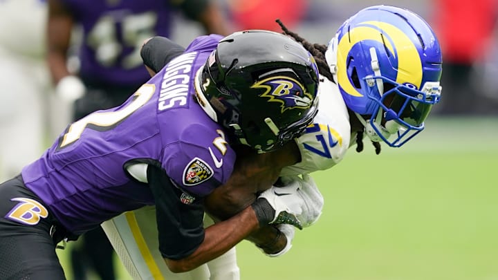 Oct 12, 2025; Baltimore, Maryland, USA; Baltimore Ravens cornerback Nate Wiggins (2) tackles Los Angeles Rams wide receiver Davante Adams (17) during the first quarter of the game at M&T Bank Stadium. Mandatory Credit: Mitch Stringer-Imagn Images
