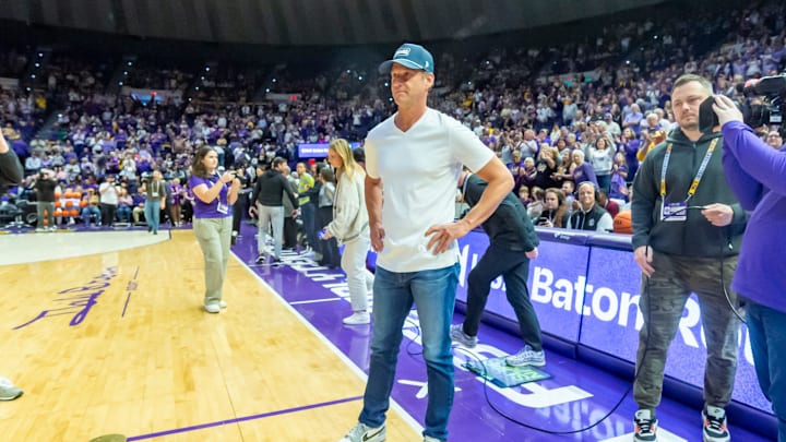 LSU Football Coach Lane Kiffin walks out with Tigers Basketball Coach Kim Mulkey, LSU Tigers Womens Basketball takes on the Kentucky Wildcats. Thursday, Jan. 1, 2026. LSU Football Coach Lane Kiffin walks out with Tigers Basketball Coach Kim Mulkey, LSU Tigers Womens Basketball takes on the Kentucky Wildcats. Thursday, Jan. 1, 2026.