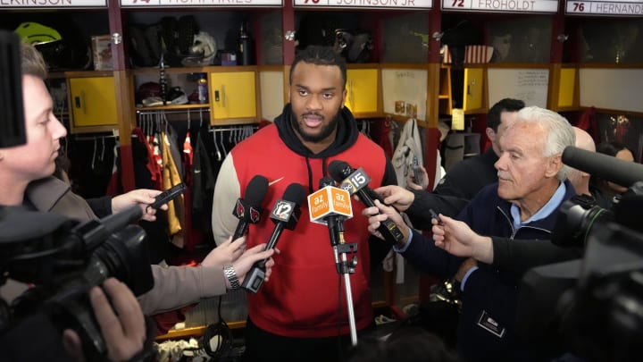 Arizona Cardinals offensive lineman Paris Johnson Jr. talks to the media during pickup day at the Cardinals facility in Tempe on Jan. 8, 2024.