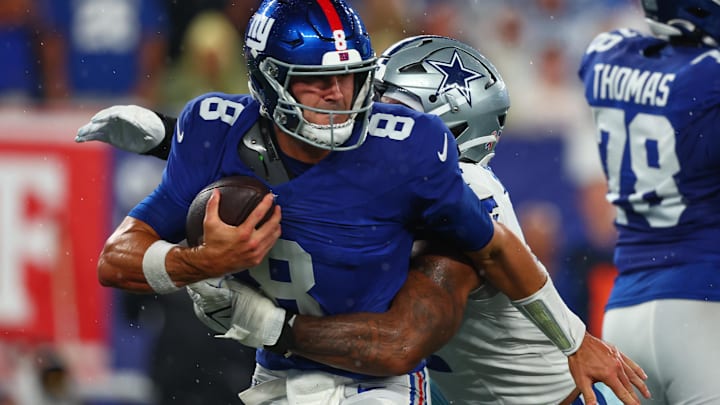 Sep 10, 2023; East Rutherford, New Jersey, USA; New York Giants quarterback Daniel Jones (8) is sacked by Dallas Cowboys linebacker Micah Parsons (11) during the first half at MetLife Stadium. Sep 10, 2023; East Rutherford, New Jersey, USA; New York Giants quarterback Daniel Jones (8) is sacked by Dallas Cowboys linebacker Micah Parsons (11) during the first half at MetLife Stadium.