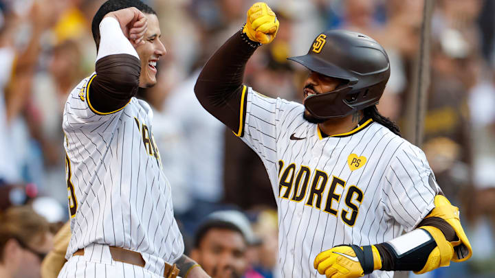 Jul 31, 2024; San Diego, California, USA; San Diego Padres catcher Luis Campusano (12) celebrates with San Diego Padres third baseman Manny Machado (13) after hitting a home run during the fourth inning against the Los Angeles Dodgers at Petco Park. Mandatory Credit: David Frerker-Imagn Images Jul 31, 2024; San Diego, California, USA; San Diego Padres catcher Luis Campusano (12) celebrates with San Diego Padres third baseman Manny Machado (13) after hitting a home run during the fourth inning against the Los Angeles Dodgers at Petco Park. Mandatory Credit: David Frerker-Imagn Images
