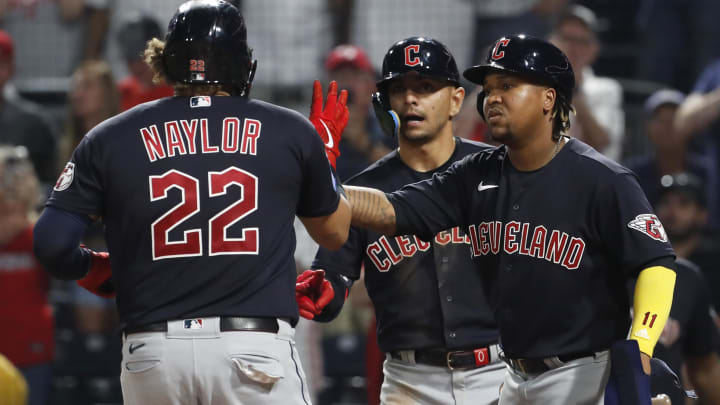 Jul 18, 2023; Pittsburgh, Pennsylvania, USA; Cleveland Guardians left fielder Steven Kwan (middle) and third baseman Jose Ramirez (right) congratulate first baseman Josh Naylor (22) on his two run home run against the Pittsburgh Pirates during the ninth inning at PNC Park. Cleveland won 10-1. Mandatory Credit: Charles LeClaire-USA TODAY Sports