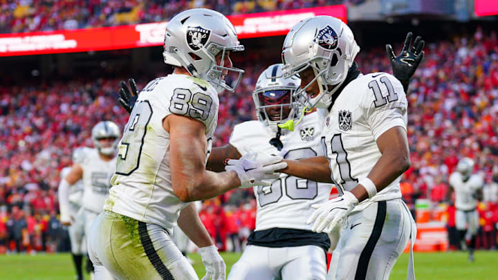 Nov 29, 2024; Kansas City, Missouri, USA; Las Vegas Raiders tight end Brock Bowers (89) celebrates with wide receiver Tre Tucker (11) after scoring against the Kansas City Chiefs during the second half at GEHA Field at Arrowhead Stadium. Mandatory Credit: Denny Medley-Imagn Images
