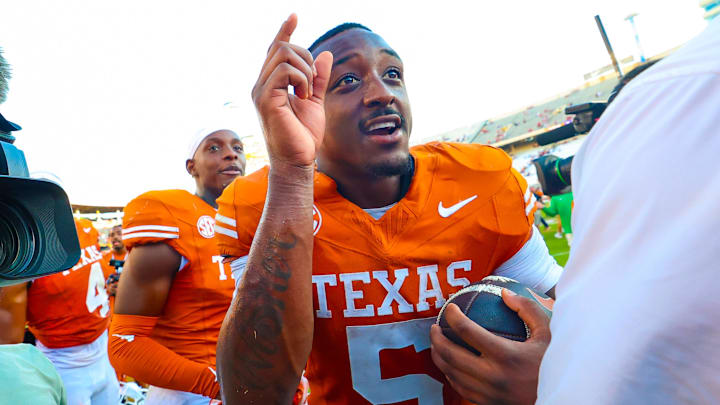 Oct 11, 2025; Dallas, Texas, USA;  Texas Longhorns running back Quintrevion Wisner (5) celebrates after the game against the Oklahoma Sooners at the Cotton Bowl. Mandatory Credit: Kevin Jairaj-Imagn Images