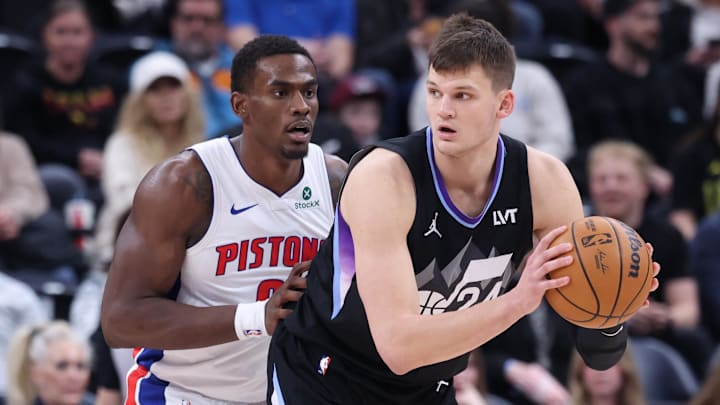 Mar 3, 2025; Salt Lake City, Utah, USA; Utah Jazz center Walker Kessler (24) posts up against Detroit Pistons center Jalen Duren (0) during the first half at Delta Center. Mandatory Credit: Rob Gray-Imagn Images