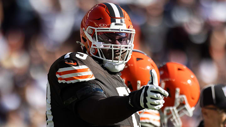Sep 8, 2024; Cleveland, Ohio, USA; Cleveland Browns offensive tackle Dawand Jones (79) gives a thumbs up as he heads to the line of scrimmage against the Dallas Cowboys during the second quarter at Huntington Bank Field. Mandatory Credit: Scott Galvin-Imagn Images