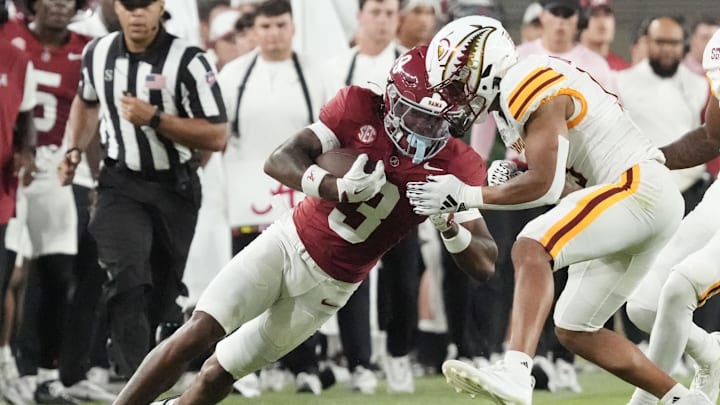 Sep 6, 2025; Tuscaloosa, Alabama, USA;  Alabama wide receiver Jaylen Mbakwe (3) is tackled by a UL Monroe defender at Saban Field at Bryant-Denny Stadium. Alabama defeated UL Monroe 73-0. Mandatory Credit: Gary Cosby Jr.-Imagn Images